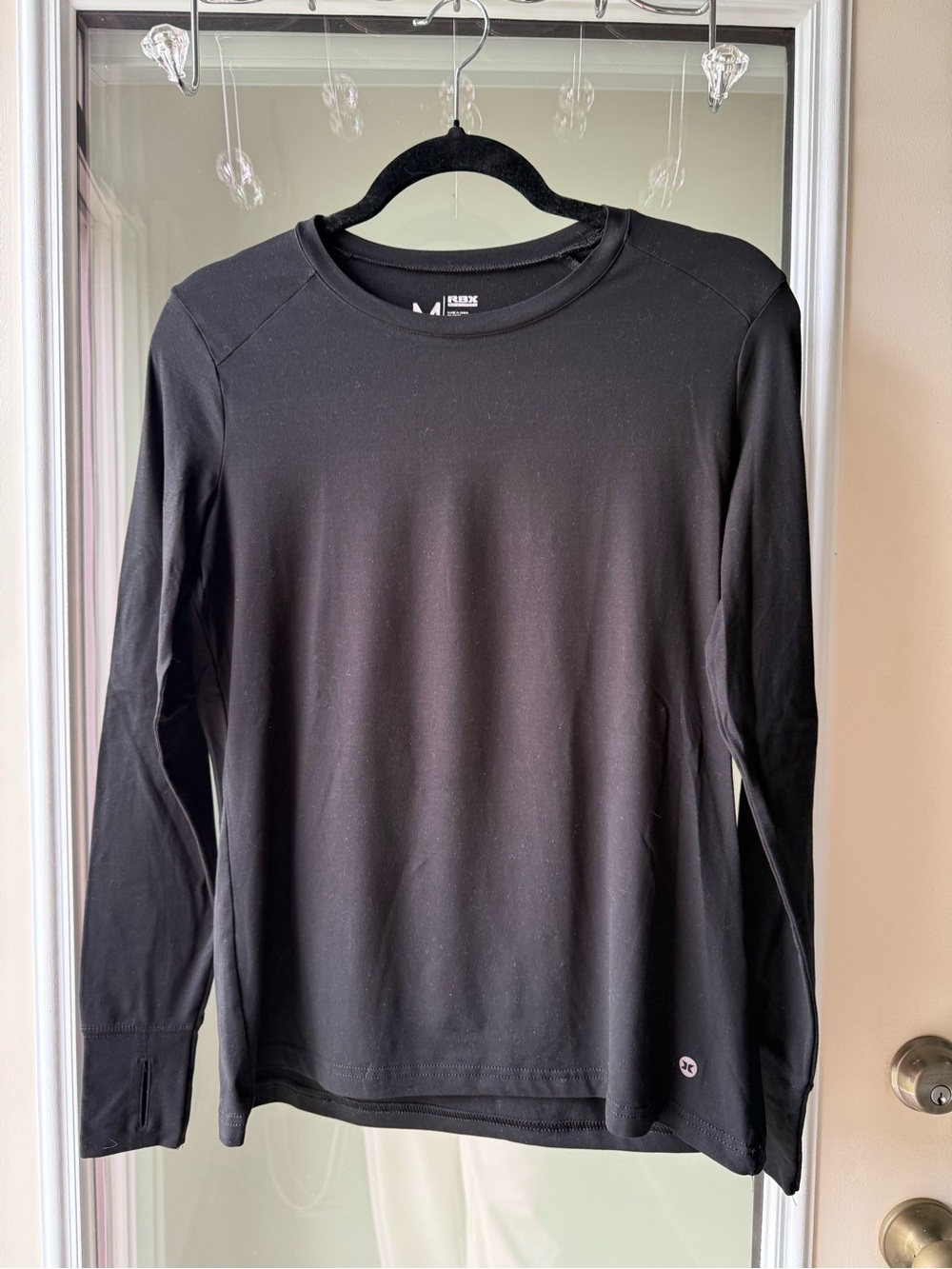 Women's Black Long-Sleeve Performance Shirt by athletica